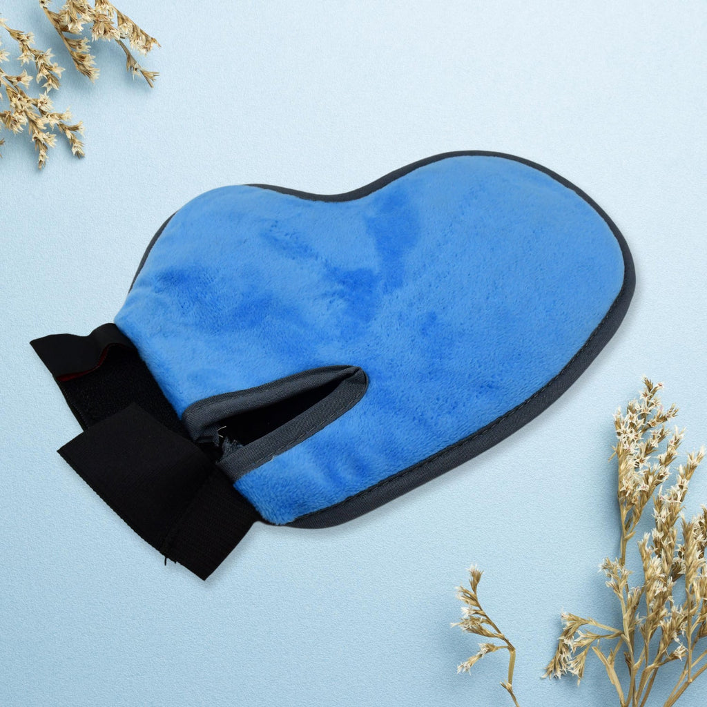 Palm Pro deshedding glove being used on a dog